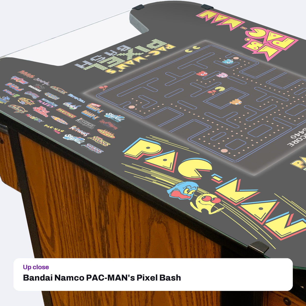 Bandai Namco PAC-MAN's Pixel Bash Home Cocktail Table, Woodgrain (32 Games), close-up detail
