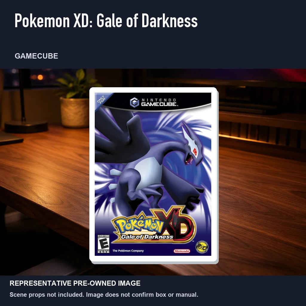 Representative pre-owned Pokemon XD: Gale of Darkness (GameCube), product image in a styled desk scene.