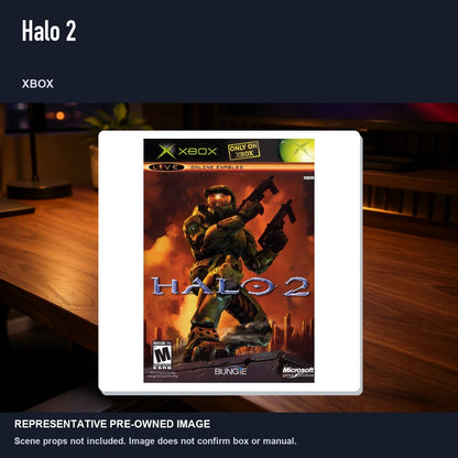 Representative pre-owned Halo 2 (Xbox), product image in a styled desk scene.