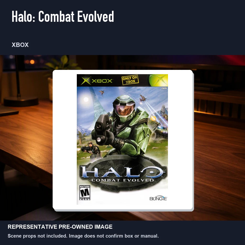 Representative pre-owned Halo: Combat Evolved (Xbox), product image in a styled desk scene.