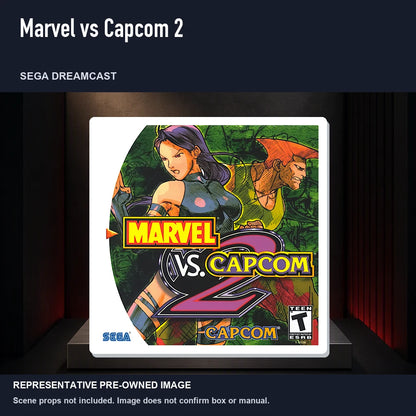 Representative pre-owned Marvel vs Capcom 2 (Sega Dreamcast), product image on a display panel.