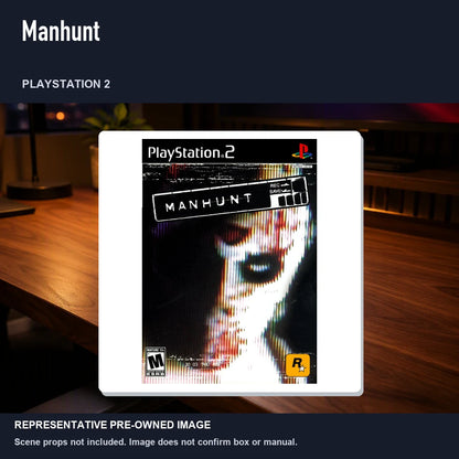 Representative pre-owned Manhunt (PlayStation 2), product image in a styled desk scene.