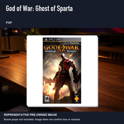Representative pre-owned God of War: Ghost of Sparta (PSP), product image in a styled desk scene.