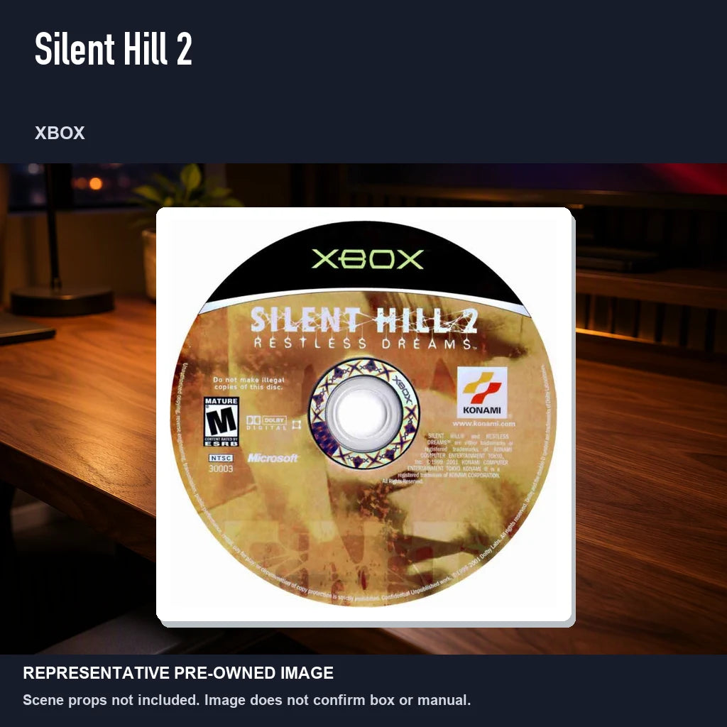 Representative pre-owned Silent Hill 2 (Xbox), product image in a styled desk scene.