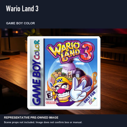 Representative pre-owned Wario Land 3 (Game Boy Color), product image in a styled desk scene.