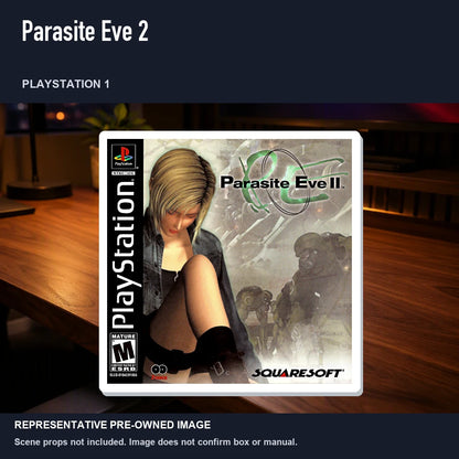 Representative pre-owned Parasite Eve 2 (PlayStation 1), product image in a styled desk scene.
