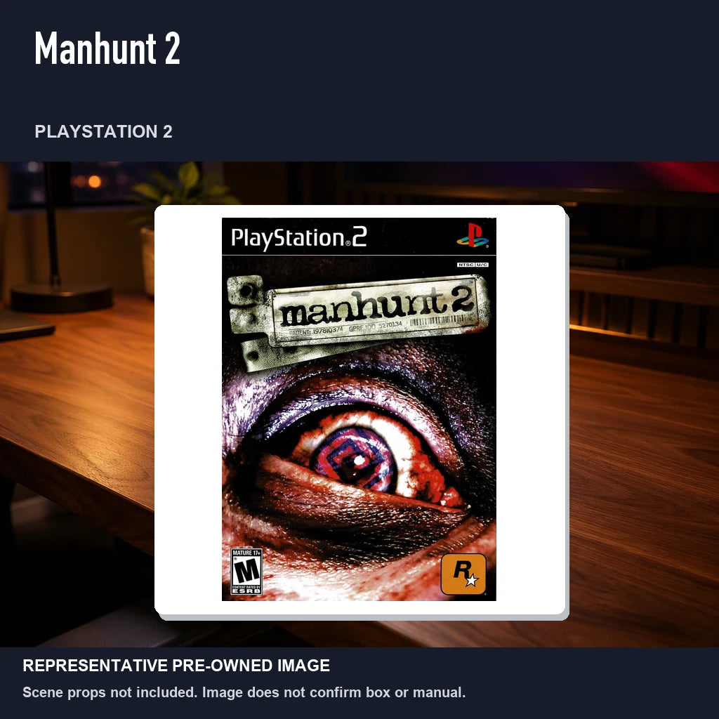 Representative pre-owned Manhunt 2 (PlayStation 2), product image in a styled desk scene.