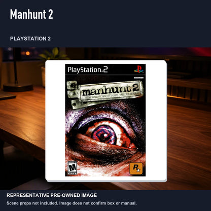 Representative pre-owned Manhunt 2 (PlayStation 2), product image in a styled desk scene.