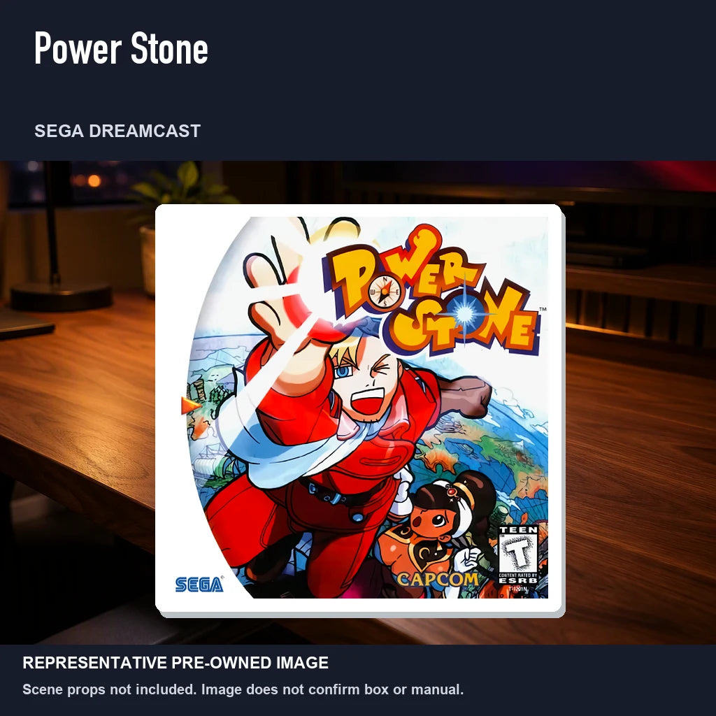 Representative pre-owned Power Stone (Sega Dreamcast), product image in a styled desk scene.