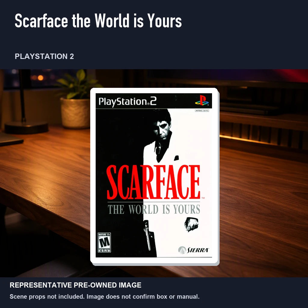 Representative pre-owned Scarface the World is Yours (PlayStation 2), product image in a styled desk scene.