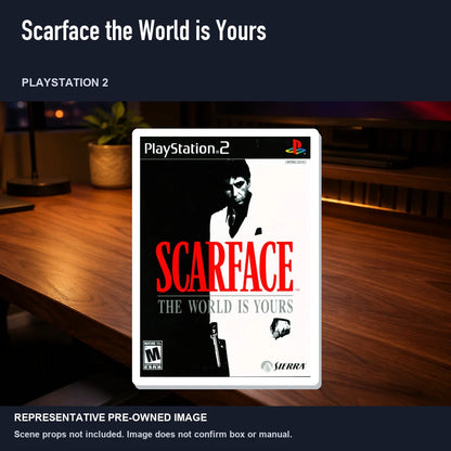 Representative pre-owned Scarface the World is Yours (PlayStation 2), product image in a styled desk scene.