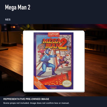 Representative pre-owned Mega Man 2 (NES), product image in a styled desk scene.
