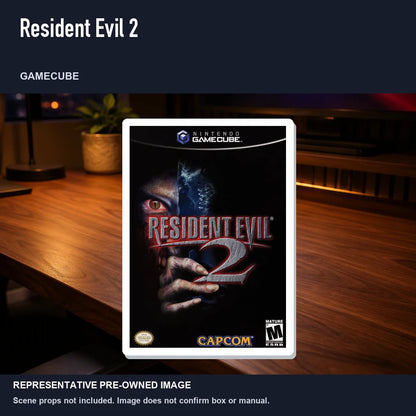 Representative pre-owned Resident Evil 2 (GameCube), product image in a styled desk scene.