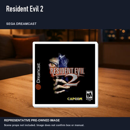 Representative pre-owned Resident Evil 2 (Sega Dreamcast), product image in a styled room scene.