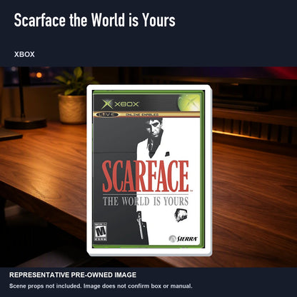 Representative pre-owned Scarface the World is Yours (Xbox), product image in a styled desk scene.