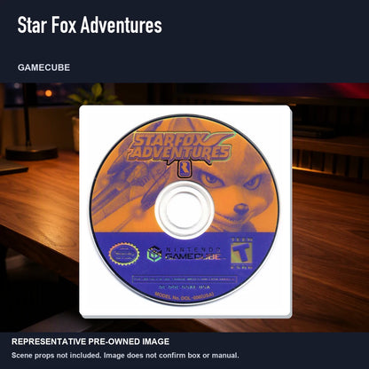 Representative pre-owned Star Fox Adventures (GameCube), product image in a styled desk scene.