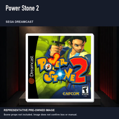 Representative pre-owned Power Stone 2 (Sega Dreamcast), product image on a display panel.