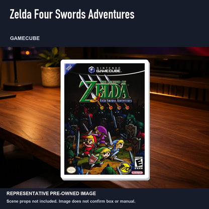 Representative pre-owned Zelda Four Swords Adventures (GameCube), product image in a styled desk scene.