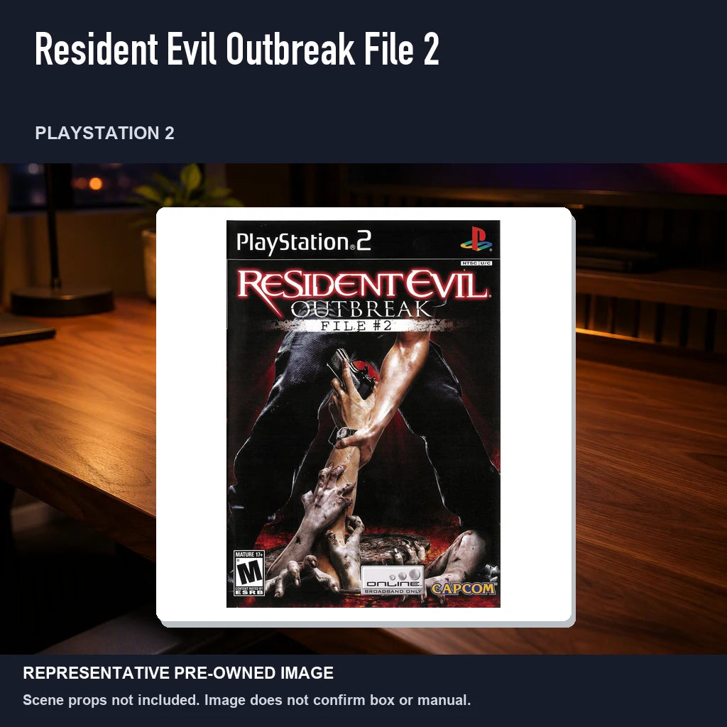 Representative pre-owned Resident Evil Outbreak File 2 (PlayStation 2), product image in a styled desk scene.