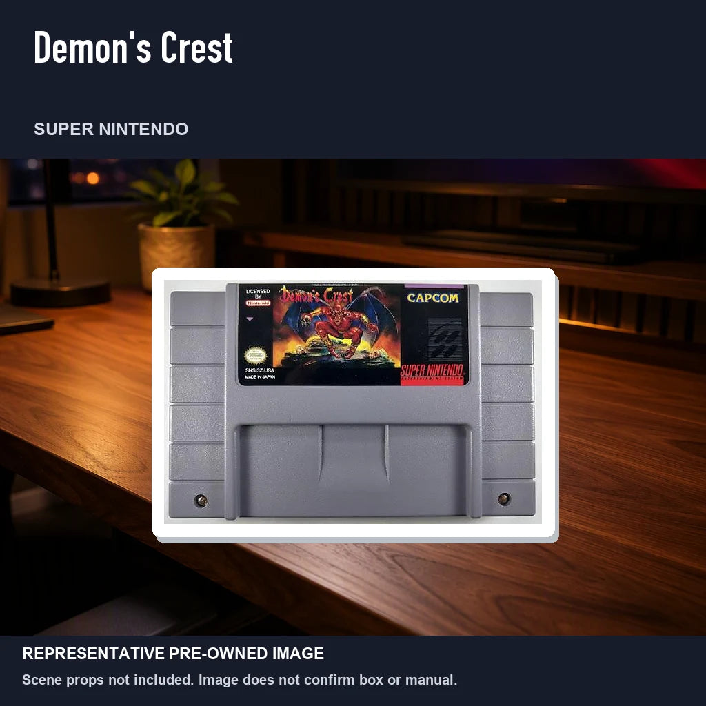 Representative pre-owned Demon's Crest (Super Nintendo), product image in a styled desk scene.