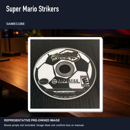 Representative pre-owned Super Mario Strikers (GameCube), product image in a styled desk scene.