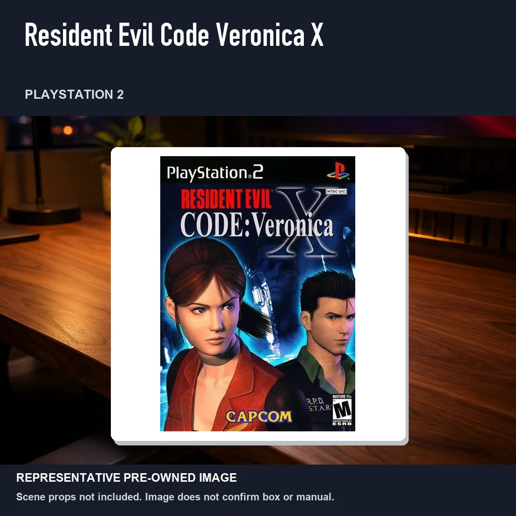 Representative pre-owned Resident Evil Code Veronica X (PlayStation 2), product image in a styled desk scene.