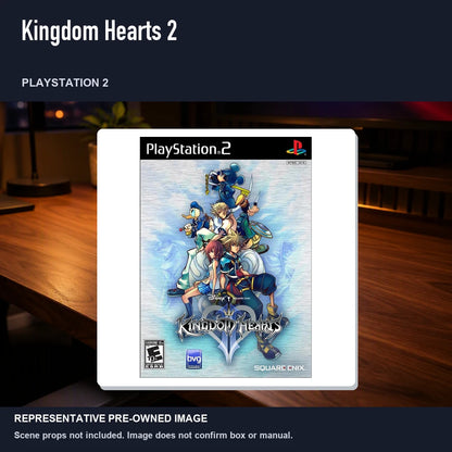 Representative pre-owned Kingdom Hearts 2 (PlayStation 2), product image in a styled desk scene.