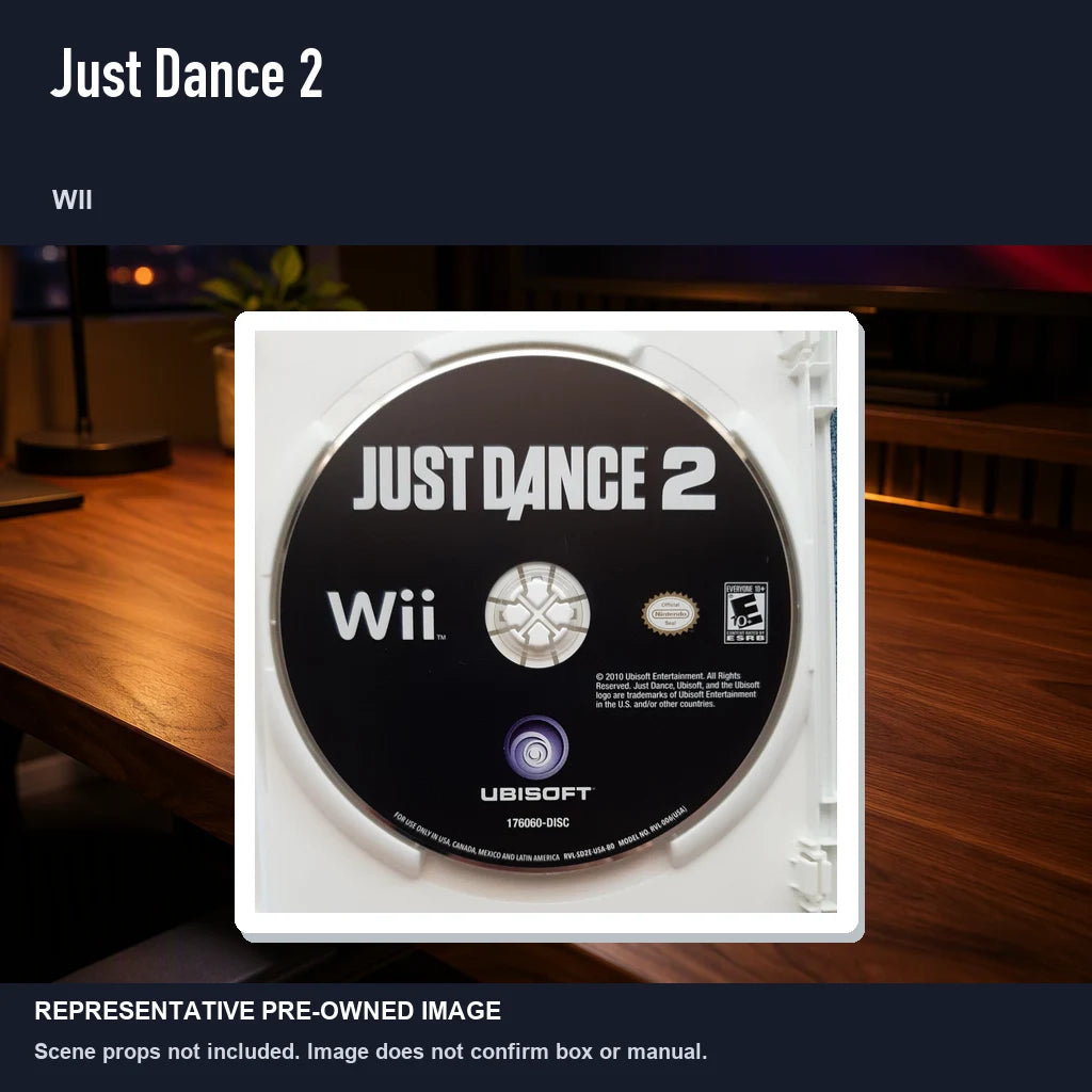 Representative pre-owned Just Dance 2 (Wii), product image in a styled desk scene.