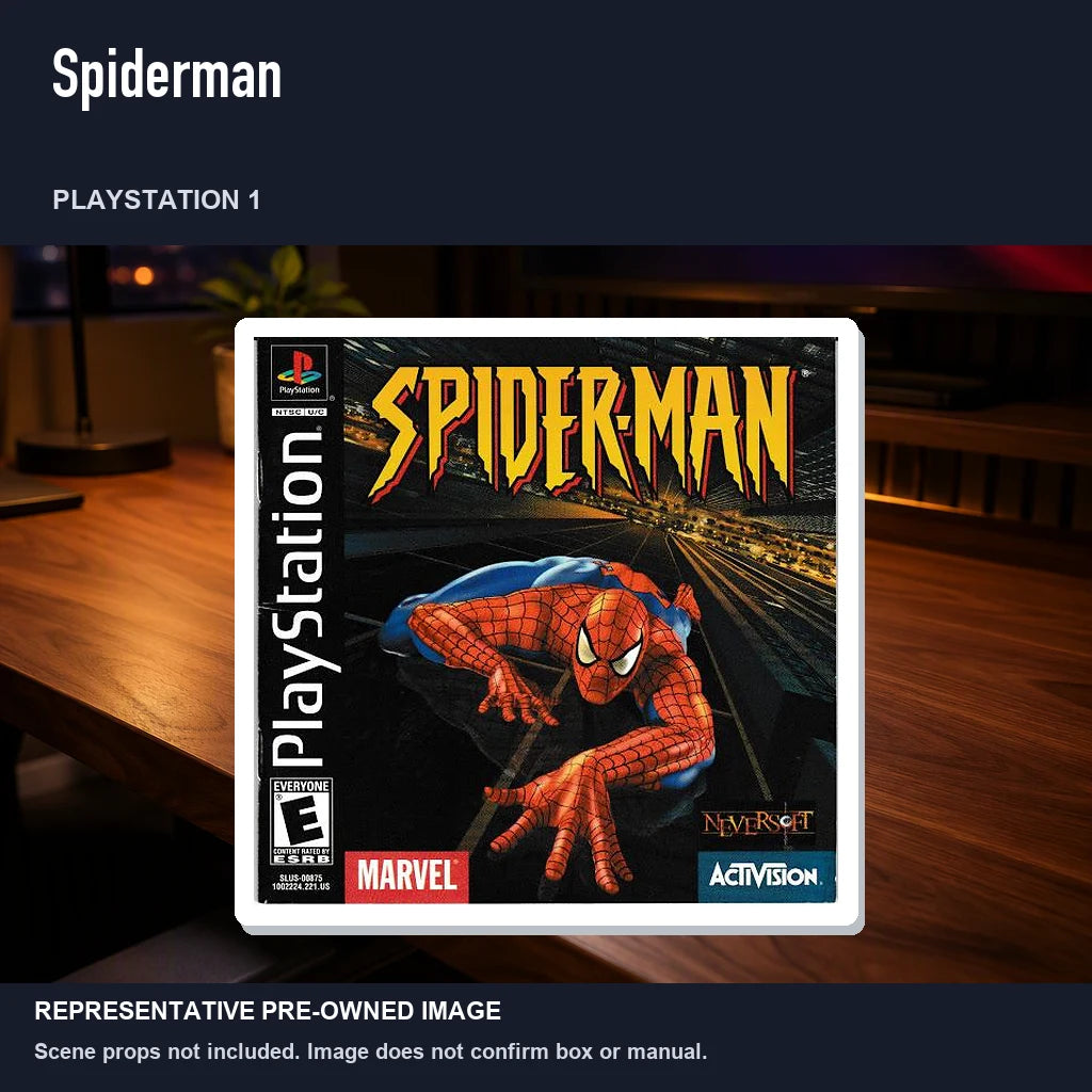 Representative pre-owned Spiderman (PlayStation 1), product image in a styled desk scene.