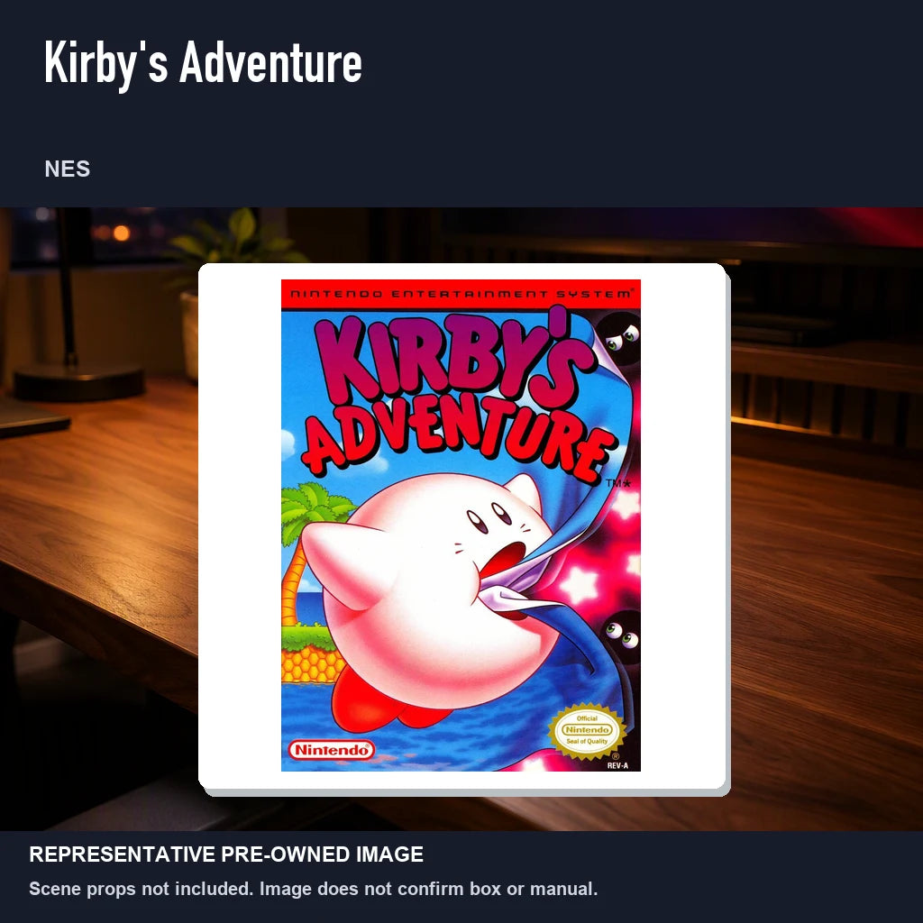 Representative pre-owned Kirby's Adventure (NES), product image in a styled desk scene.
