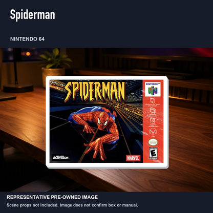 Representative pre-owned Spiderman (Nintendo 64), product image in a styled desk scene.