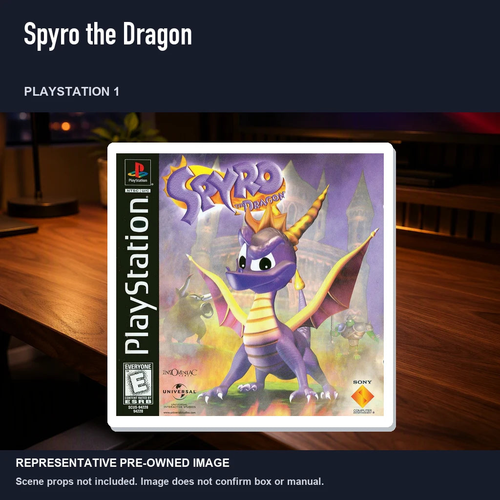 Representative pre-owned Spyro the Dragon (PlayStation 1), product image in a styled desk scene.