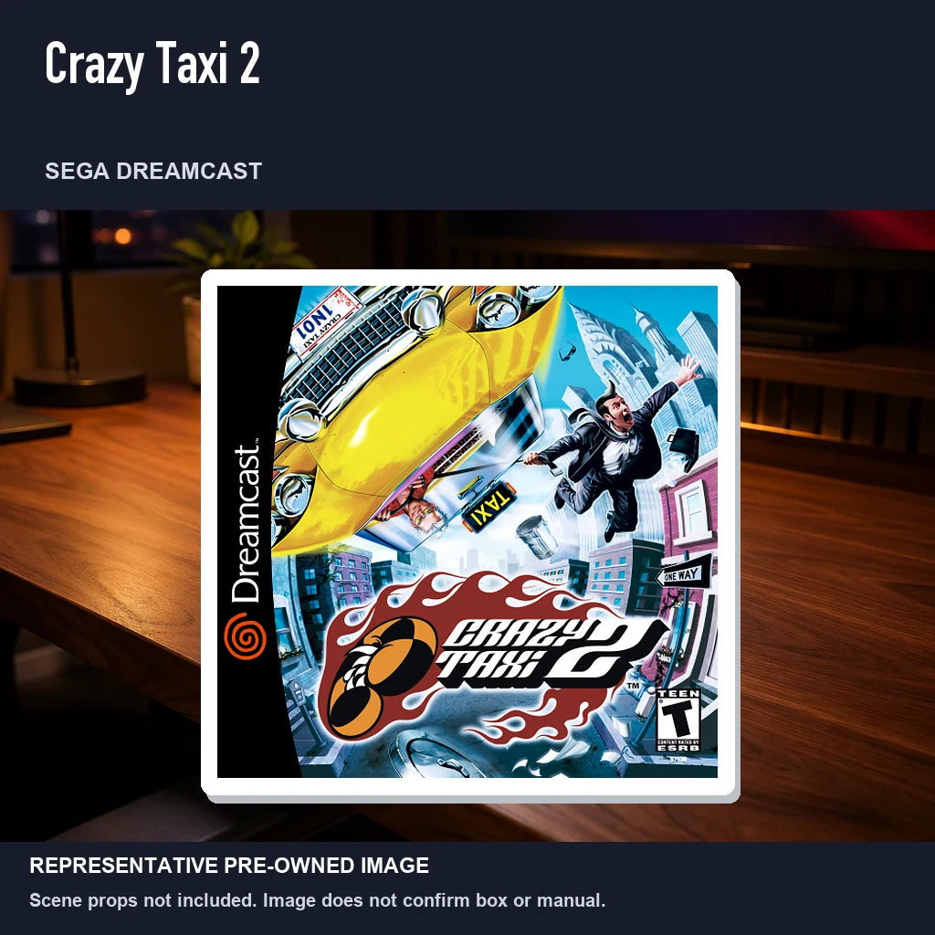 Representative pre-owned Crazy Taxi 2 (Sega Dreamcast), product image in a styled desk scene.