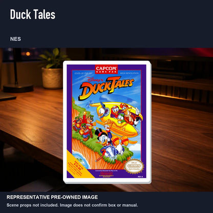 Representative pre-owned Duck Tales (NES), product image in a styled desk scene.