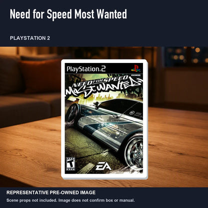 Representative pre-owned Need for Speed Most Wanted (PlayStation 2), product image in a styled room scene.