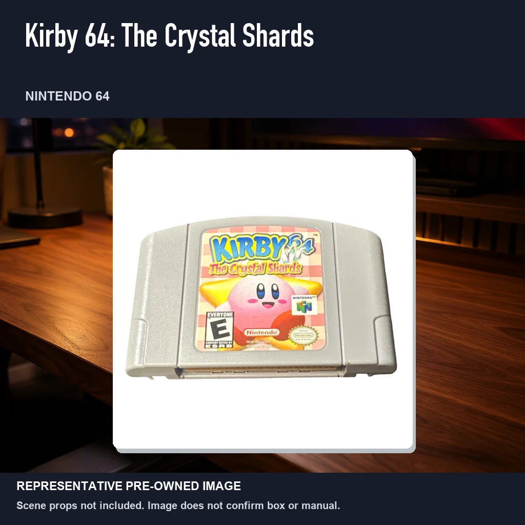 Representative pre-owned Kirby 64: The Crystal Shards (Nintendo 64), product image in a styled desk scene.