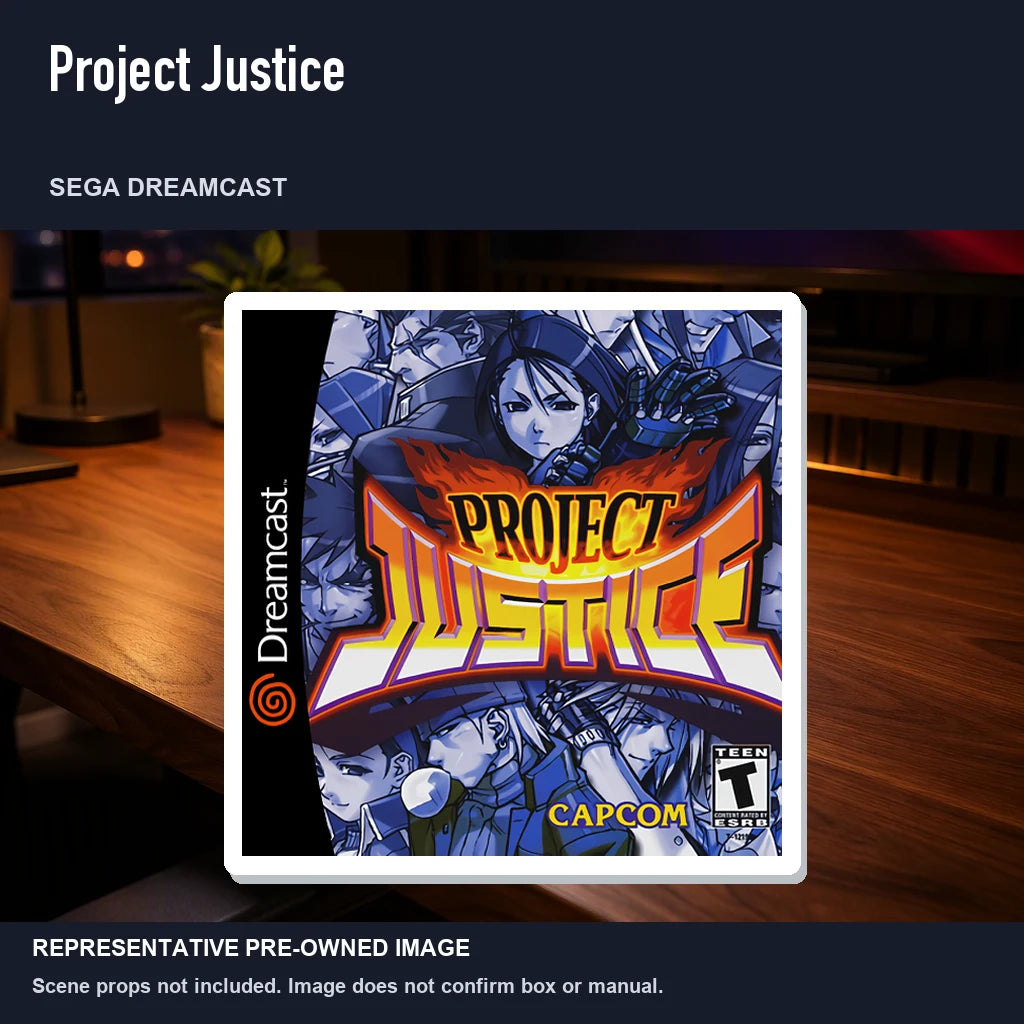 Representative pre-owned Project Justice (Sega Dreamcast), product image in a styled desk scene.