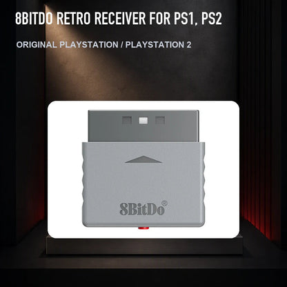 8BitDo Retro Receiver for PS1, PS2 on a collector display plinth