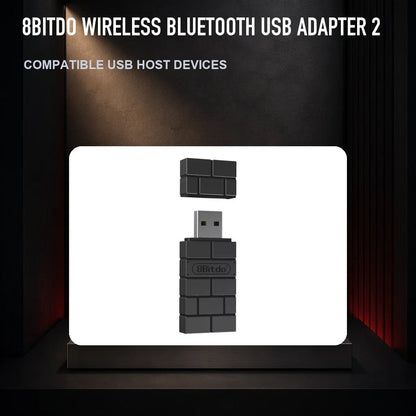 8BitDo Wireless Bluetooth USB Adapter 2 on a collector display plinth