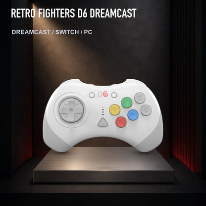 Retro Fighters D6 Dreamcast on a collector display plinth