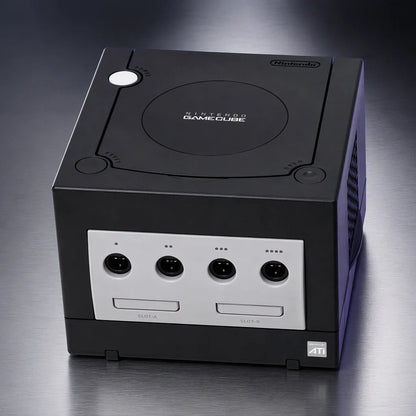 Representative Black Nintendo GameCube system one standalone black Nintendo GameCube console on a brushed-metal gallery pedestal, not the specific RGM unit