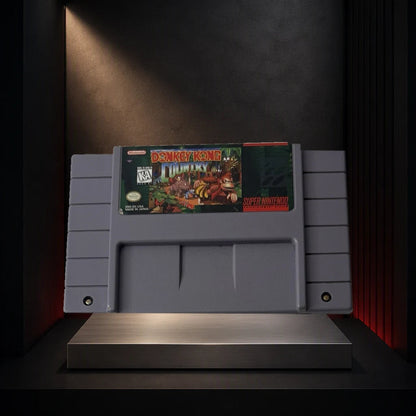 Representative Donkey Kong Country loose usa cartridge on a dark collector display plinth, not the specific RGM unit