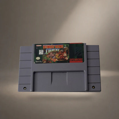 Representative Donkey Kong Country loose usa cartridge in a soft neutral gallery spotlight, not the specific RGM unit