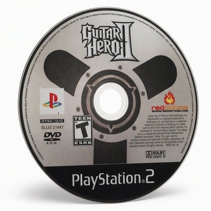 Representative Guitar Hero II one loose black-label North American PlayStation 2 DVD disc on a clean white catalog background, not the specific RGM unit