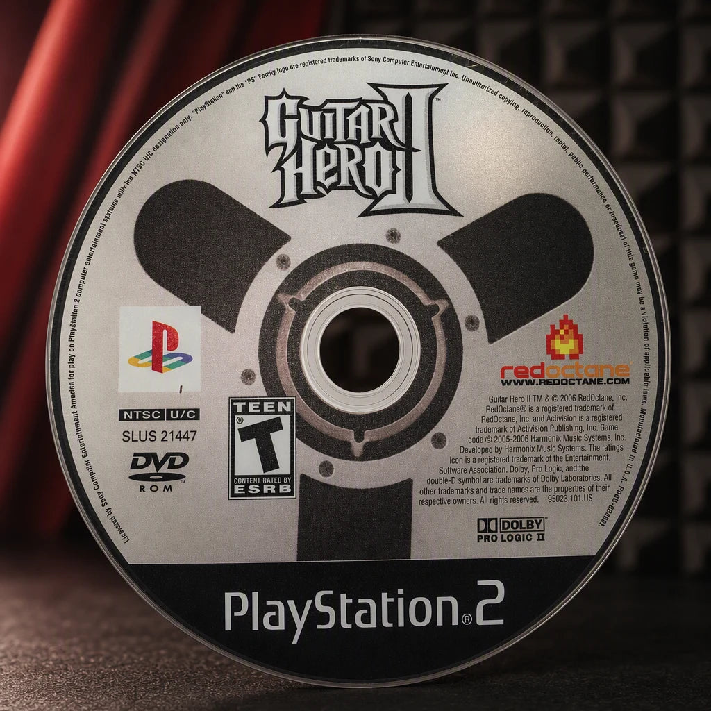 Representative Guitar Hero II one loose black-label North American PlayStation 2 DVD disc in a close macro view of the authentic printed identity, not the specific RGM unit