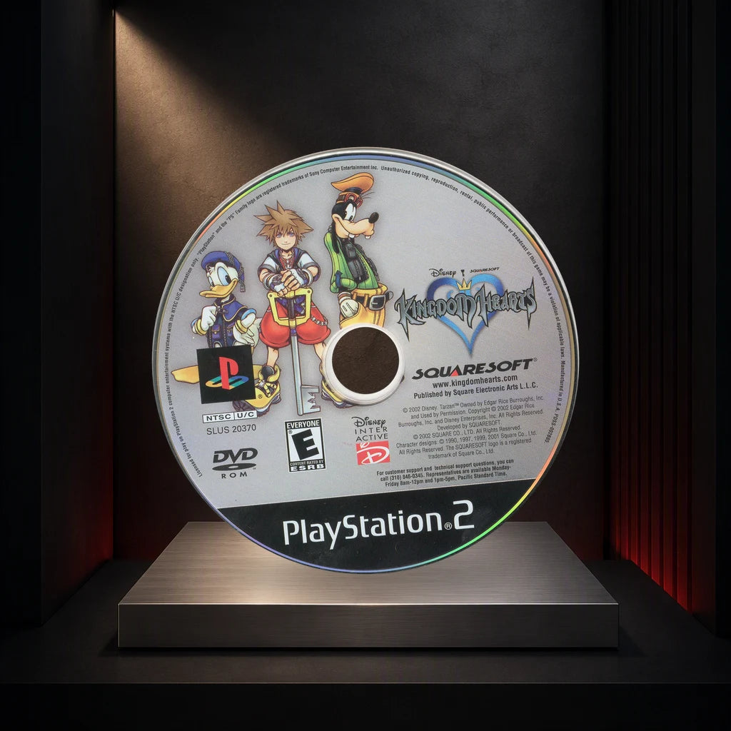 Representative Kingdom Hearts loose ntsc-u dvd-rom on a dark collector display plinth, not the specific RGM unit