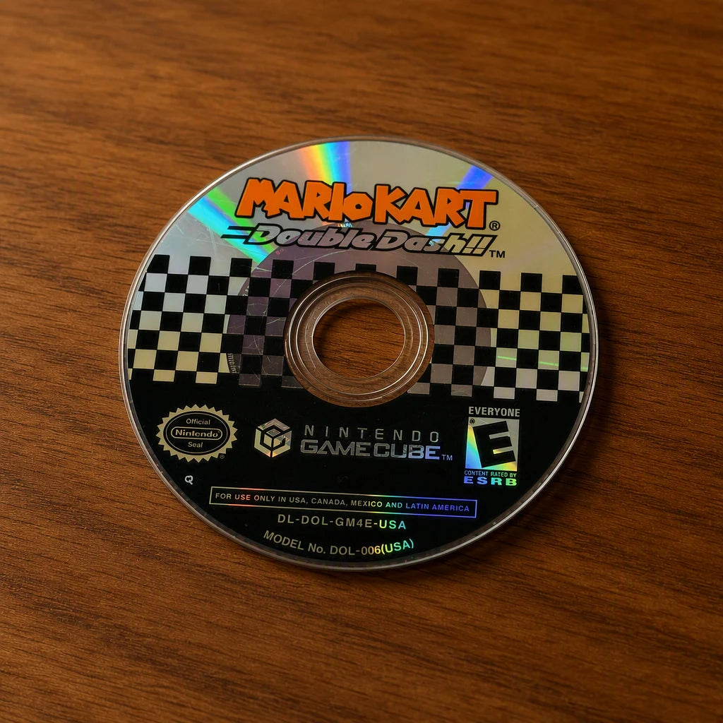 Representative Mario Kart Double Dash Nintendo GameCube game disc on a walnut tabletop