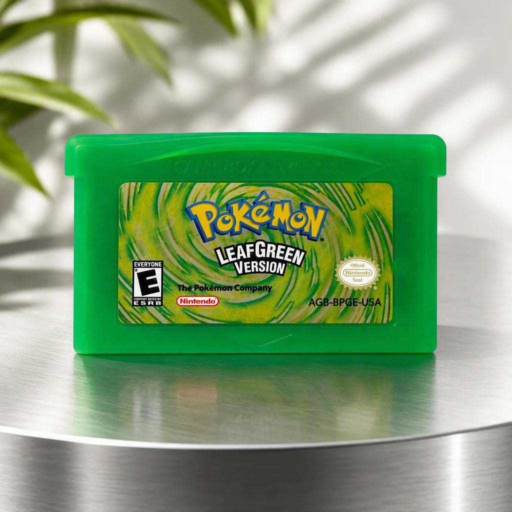 Representative Pokemon LeafGreen Version one loose translucent-green North American Game Boy Advance cartridge on a brushed-metal gallery pedestal, not the specific RGM unit