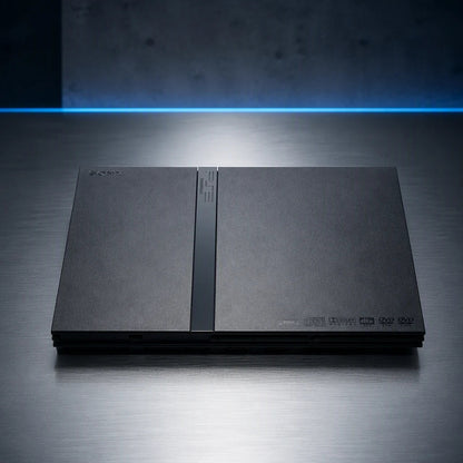 Representative PlayStation 2 Slim system one standalone black PlayStation 2 Slim console on a brushed-metal gallery pedestal, not the specific RGM unit
