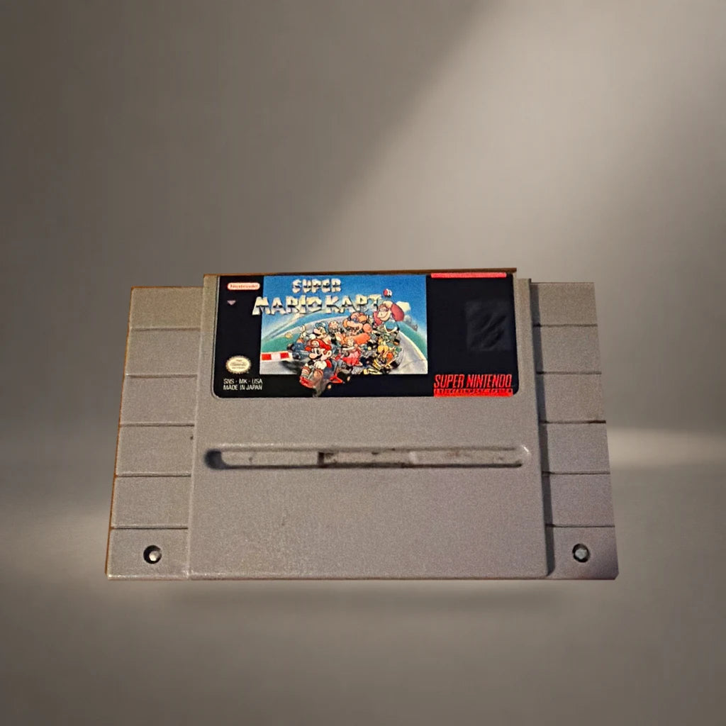 Representative Super Mario Kart loose usa cartridge in a soft neutral gallery spotlight, not the specific RGM unit